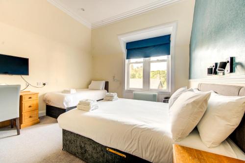 The Morar Hotelにあるベッド