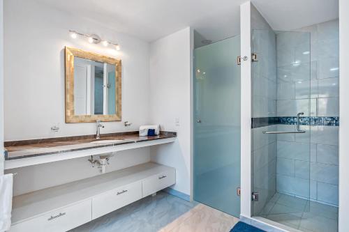 a bathroom with a sink and a shower at Morgan Residences 508A in Cabo San Lucas