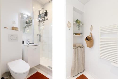 坎城的住宿－Studio centre cannes，白色的浴室设有卫生间和淋浴。