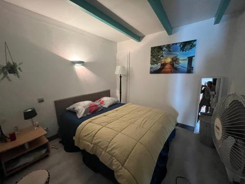 Posteľ alebo postele v izbe v ubytovaní Calme et tranquillité