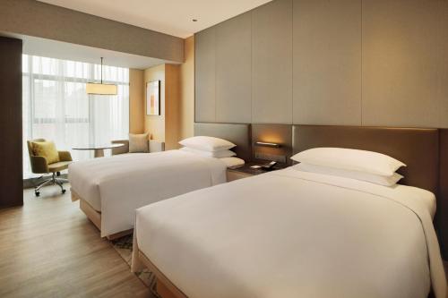 Postel nebo postele na pokoji v ubytování Delta Hotels by Marriott Xi'an