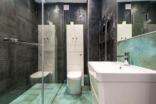 a bathroom with a sink and a toilet and a shower at Elevate Your Stay - Luxury Apartments in Gillingham in Gillingham