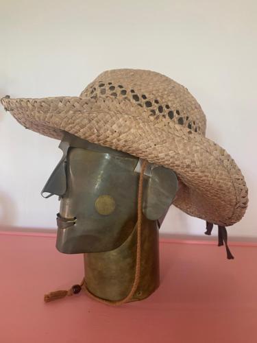 a statue of a man wearing a straw hat at Casa Diego Bielefeld mit Garten in Bielefeld