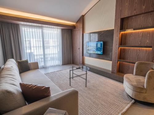 Adenya Hotel & Resort Halal All Inclusiveにあるテレビまたはエンターテインメントセンター