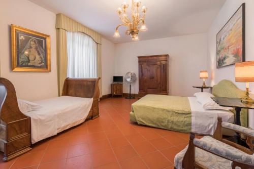 Ένα ή περισσότερα κρεβάτια σε δωμάτιο στο Villa Licia, Val D'orcia, Private Pool, Jacuzzi, Wifi