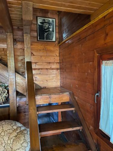 a room with stairs in a wooden cabin at Top of the hill - Paradise in Ulcinj