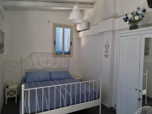 Ένα ή περισσότερα κρεβάτια σε δωμάτιο στο Villa Sicily Sul Mare Tra Catania e Siracusa