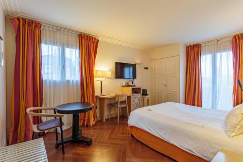 Ένα ή περισσότερα κρεβάτια σε δωμάτιο στο Grand Tonic Hotel & SPA NUXE