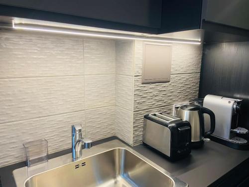 Una cocina o kitchenette en Amazing 6P Club Eiffel