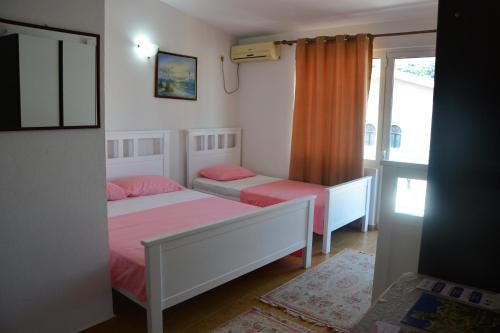 Postel nebo postele na pokoji v ubytování Guest House Vera