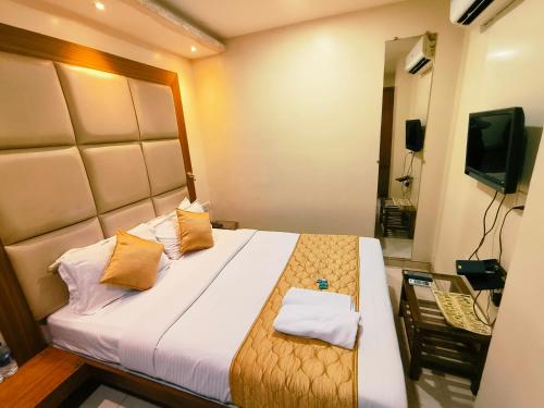 TV a/nebo společenská místnost v ubytování Apex Hotel