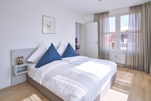 Postel nebo postele na pokoji v ubytování Lüttjeod Apartmentvilla Lüttjeod Apartmentvilla 08