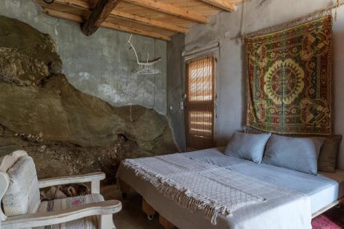 Ένα ή περισσότερα κρεβάτια σε δωμάτιο στο Magical Retreat Tinos