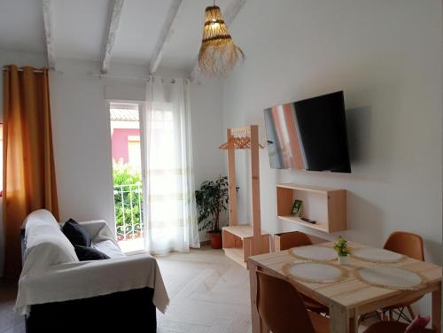 TV a/nebo společenská místnost v ubytování Loft C El Ramellet