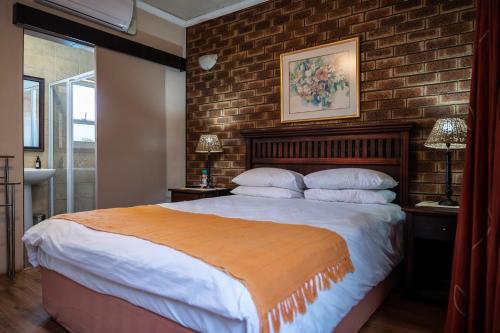 Cama o camas de una habitación en Asante Guest House