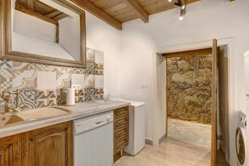 Kuchyň nebo kuchyňský kout v ubytování Casa Tajinaste