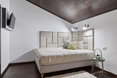 Postel nebo postele na pokoji v ubytování Green Luxury Villa