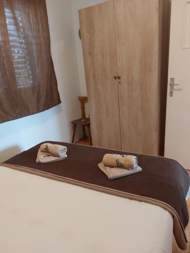 Posteľ alebo postele v izbe v ubytovaní Apartments Škerlep