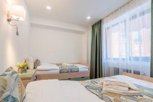 Tempat tidur dalam kamar di Spacious 2-bed. Perfect for family & friends