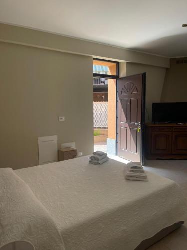 Postel nebo postele na pokoji v ubytování B&B Licia Home