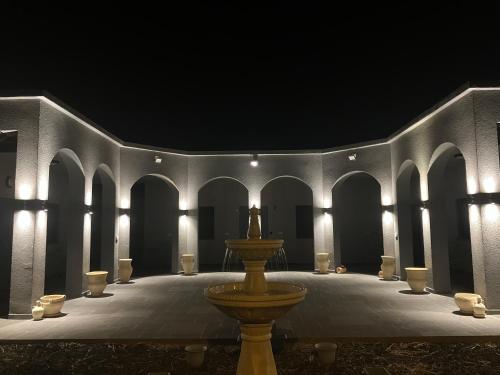 a large room with a fountain in the middle at בסנדלים: חאן בוטיק בגולן in Ma'ale Gamla