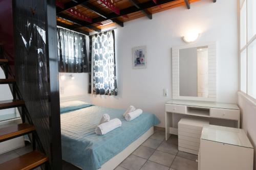 Postel nebo postele na pokoji v ubytování Markakis Apartments