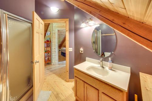 A bathroom at Lakefront Cabin with Dock, Grill, 8 Mi to Munising!