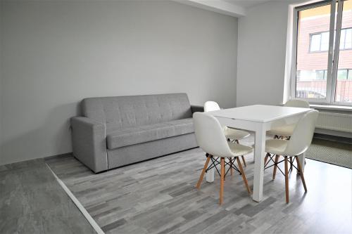 Posezení v ubytování Bright and cozy apartment nr. 1