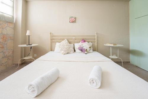Ένα ή περισσότερα κρεβάτια σε δωμάτιο στο Effie Rooms