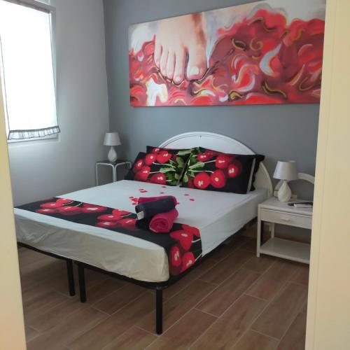 Postel nebo postele na pokoji v ubytování B&B Al Melograno