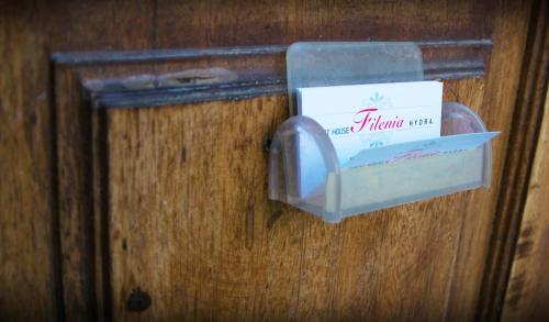 a box on a door with a sign on it at Filenia in Hydra
