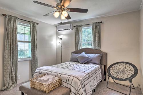 a bedroom with a bed and a ceiling fan at Spacious Family Home on Lake Marion with Boat Ramp! 