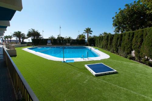 The swimming pool at or close to TAO 1 Primera línea de Playa VELILLA