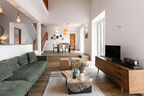 TV a/nebo společenská místnost v ubytování Alma Country House