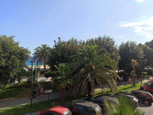 a group of cars parked in a parking lot at Grand Hotel Moroni in Finale Ligure