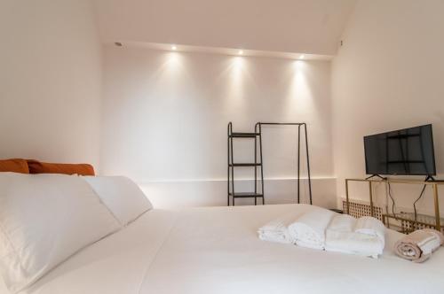 Ένα ή περισσότερα κρεβάτια σε δωμάτιο στο Umbrian Concierge - Villa Imbriani