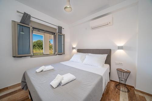Postel nebo postele na pokoji v ubytování Mirabilia Apartment
