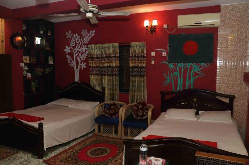 Ένα ή περισσότερα κρεβάτια σε δωμάτιο στο GREEN LEAF GUEST HOUSE