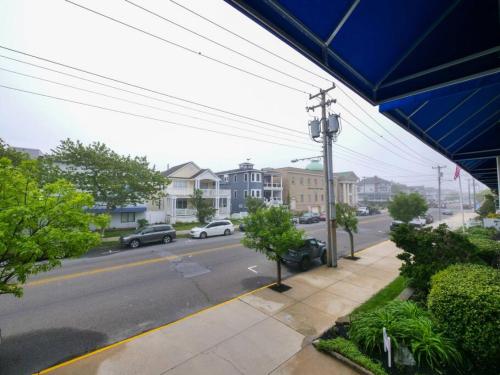 a view of a street with cars parked on the road at Trendy 1BD Balcony Pool Small fam or couples stay in Ocean City