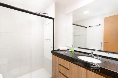 Phòng tắm tại Estúdio Aconchegante Com Vista para Piscina