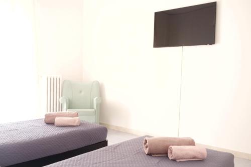 TV a/nebo společenská místnost v ubytování NERI Rooms