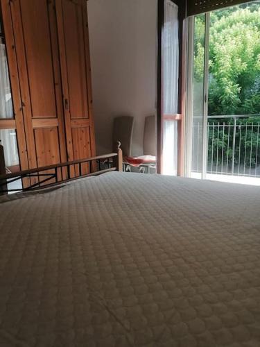 Postel nebo postele na pokoji v ubytování BabbaroHouse - casa vacanza