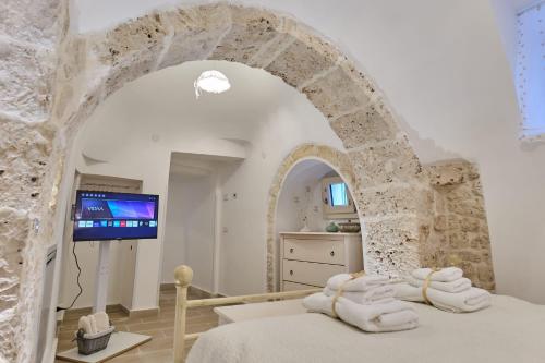 Katil atau katil-katil dalam bilik di I Trulli di Cosimo Luxury