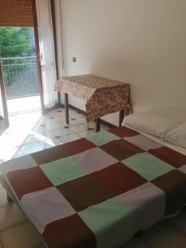 Postel nebo postele na pokoji v ubytování BabbaroHouse - casa vacanza