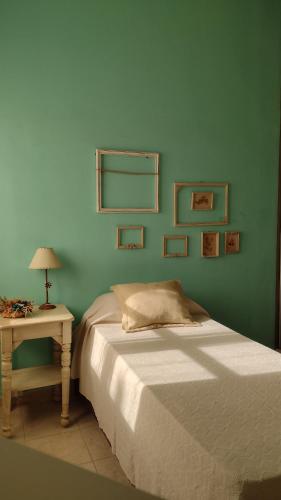 Кровать или кровати в номере Casa Isabella