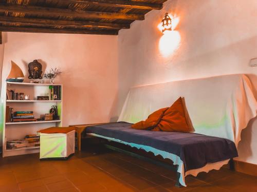 Giường trong phòng chung tại Casa dos Anoes