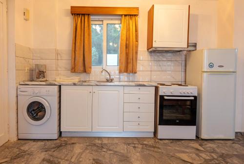Kuchyň nebo kuchyňský kout v ubytování Seaheaven houses B2