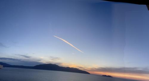 a view of a sunset over a body of water at Hotel Kappa3 Villas in Vlorë