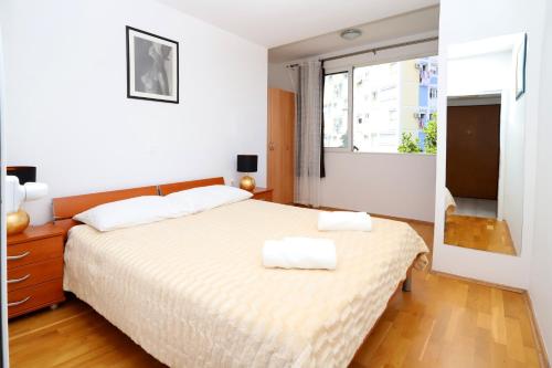 Posteľ alebo postele v izbe v ubytovaní Apartments with WiFi Split - 19226