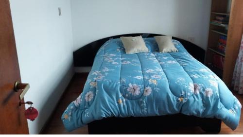 Postel nebo postele na pokoji v ubytování Hospedaje compartido SOL